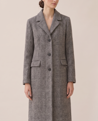 Long Checked Wool-Blend Coat — lapels and buttons, worn