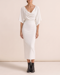 Harrow Sleek Batwing Sleeve Knit Midi Dress — fitted knit skirt, worn
