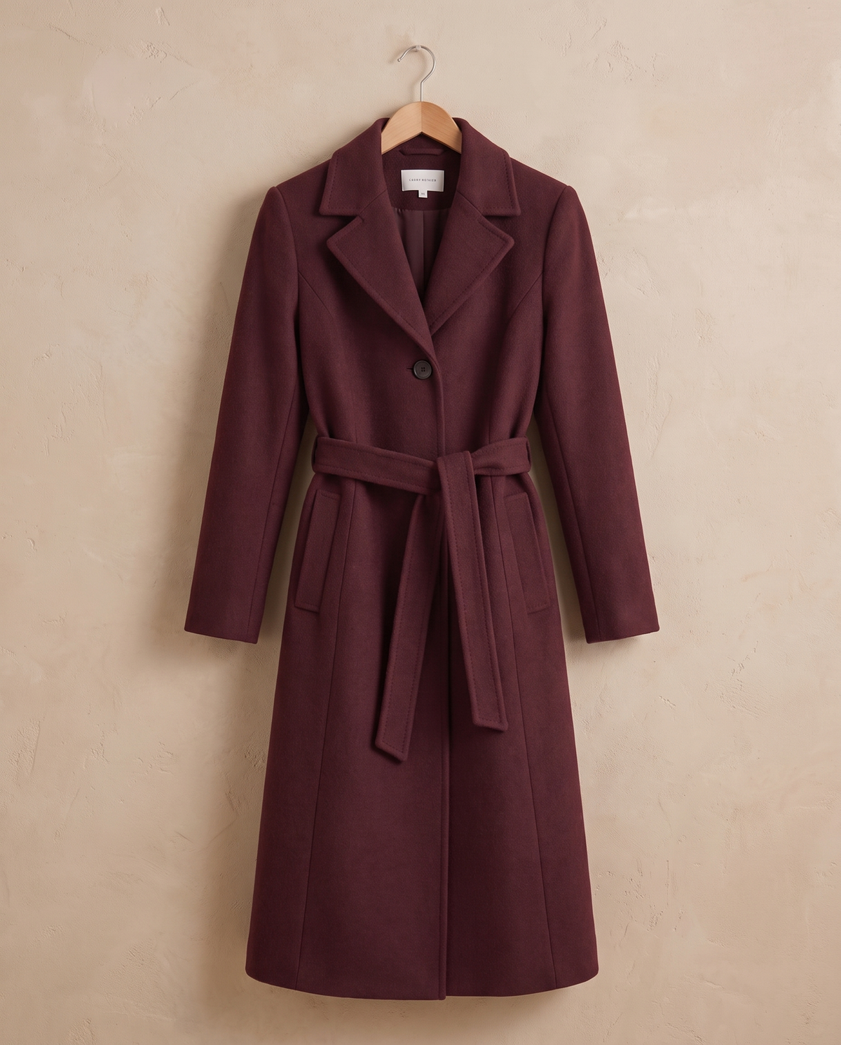 Burgundy Belted Long Coat for Women — on hanger