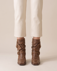 Distressed Ankle Boots with Buckle Straps — worn, studio