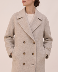 Long Double-Breasted Overcoat for Women — lapels and pockets, worn
