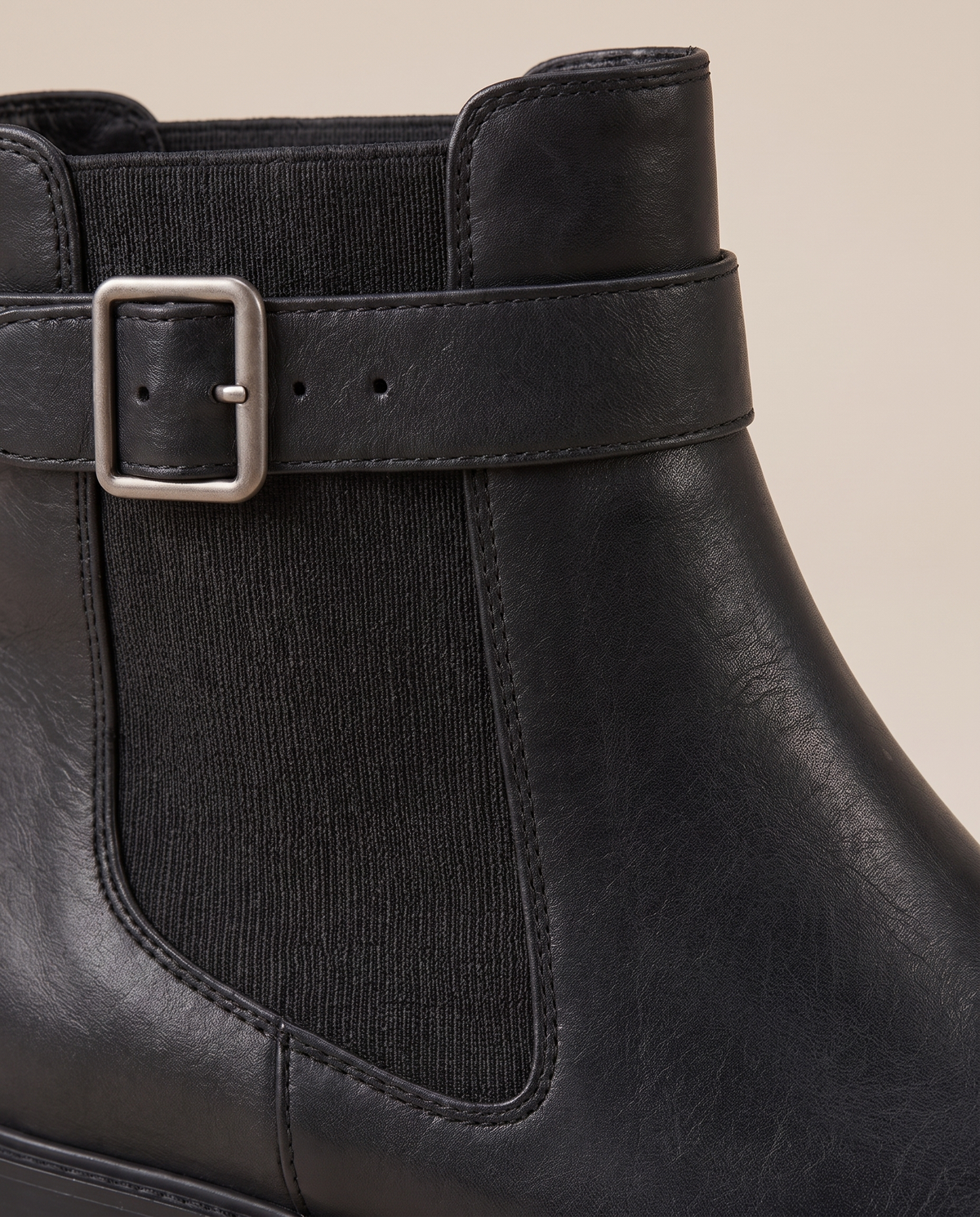 Pull-On Ankle Boots with Buckle Strap and Lug Sole — buckle close-up