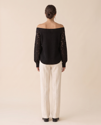 Ischia Relaxed Off-Shoulder Cable Knit V-Neck Sweater — studio back