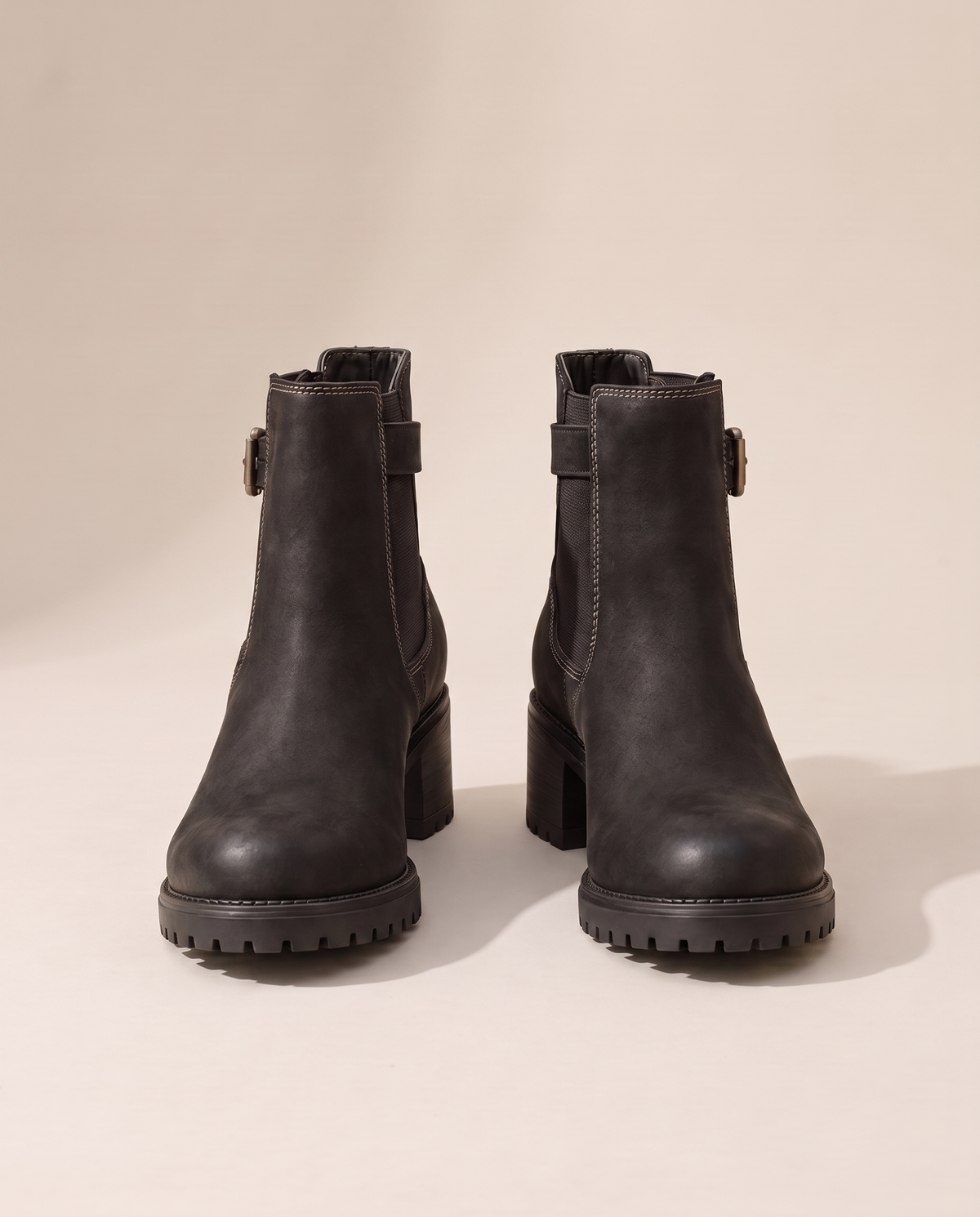 Chelsea Ankle Boots with Buckle Strap and Lug Sole — pair, studio