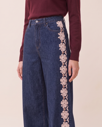Close-up of the waistband and floral lace side panel