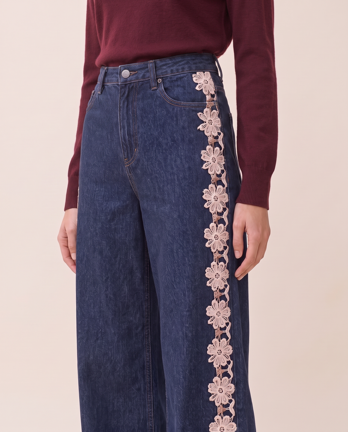Close-up of the waistband and floral lace side panel