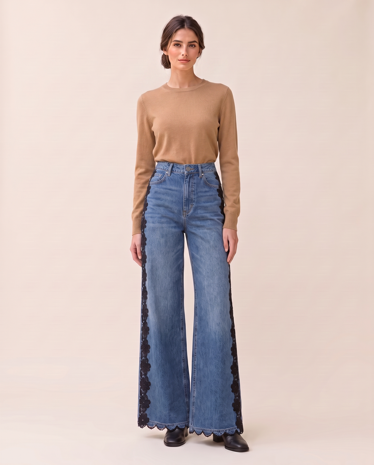 Light blue lace-inset wide-leg jeans with a camel sweater