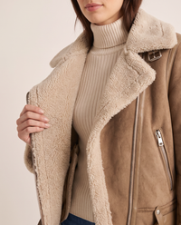 Sherpa-Lined Leather Jacket for Women — sherpa collar, lining and zip pocket detail