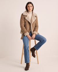Sherpa-Lined Leather Jacket for Women — worn seated