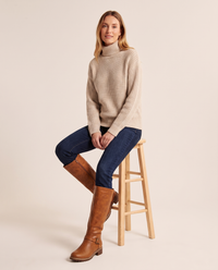 Knee-High Riding Boots with Buckle Strap for Women — worn seated