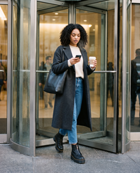 Chunky Platform Leather Ankle Boots with Front Zip — heading into a New York office lobby