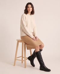 Lace-Up Knee-High Boots with Low Block Heel for Women — worn seated