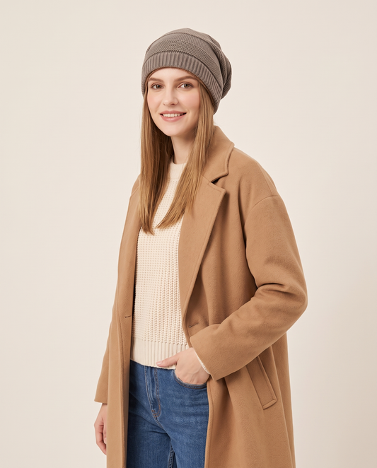 Fleece-Lined Knit Beanie for Women — three-quarter view with a winter coat
