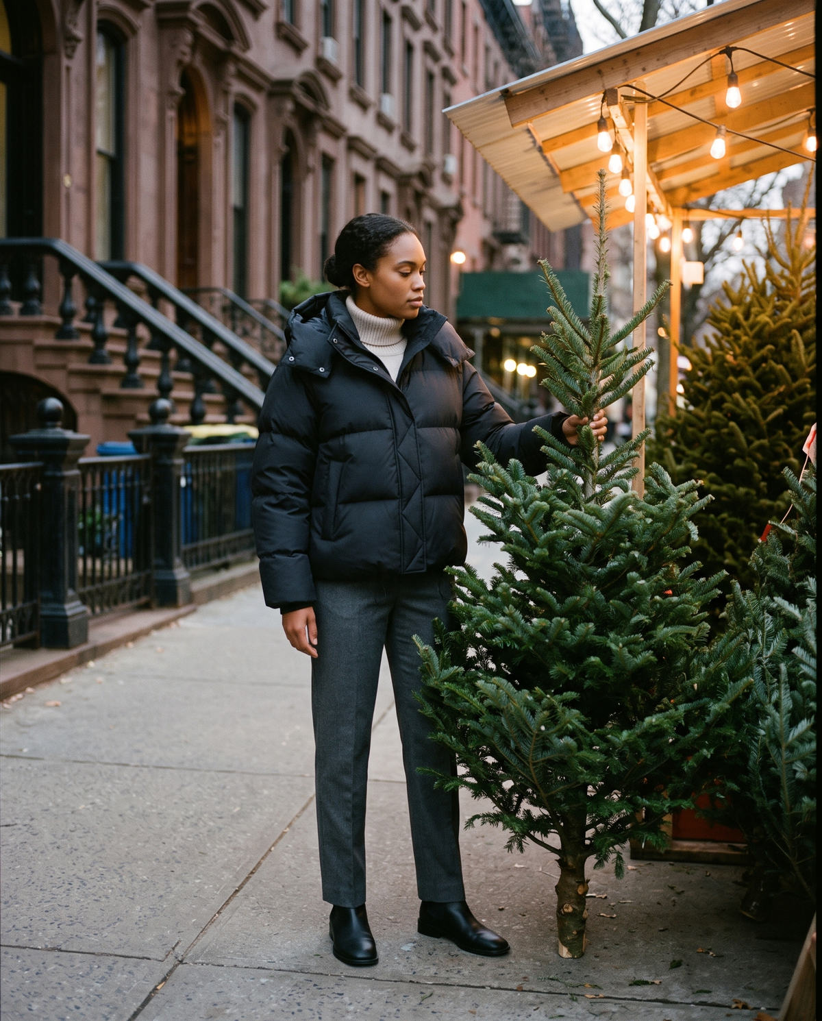 Oversized Hooded Puffer Jacket for Women — choosing a Christmas tree at a New York sidewalk stand