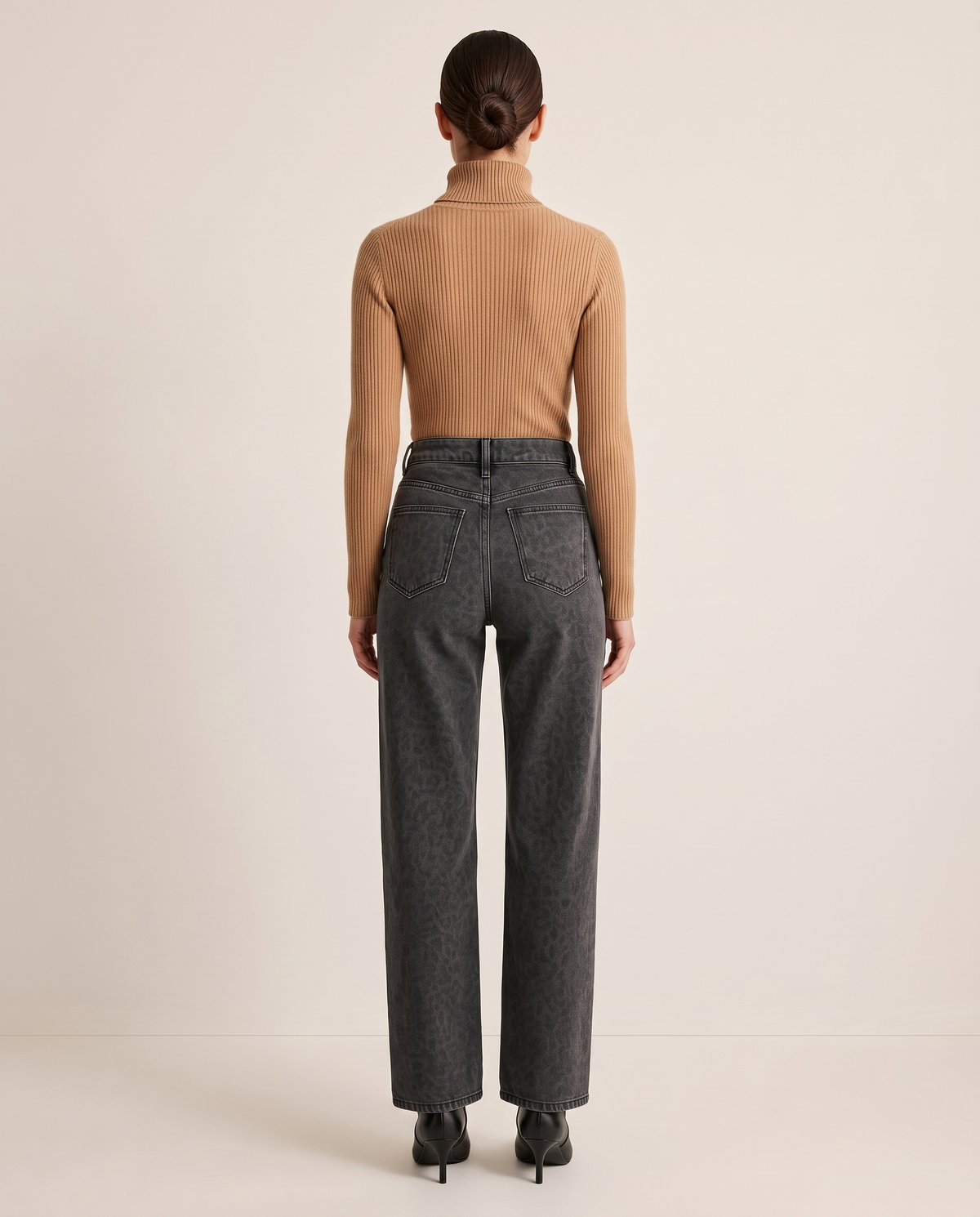 Black leopard print straight-leg jeans, studio back view