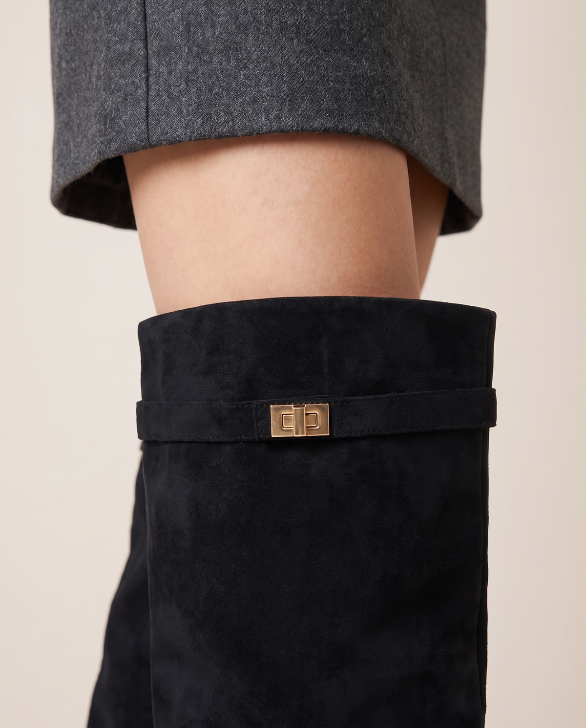 Women's Black Slouchy Suede Knee High Boots — fold-over cuff and gold buckle detail