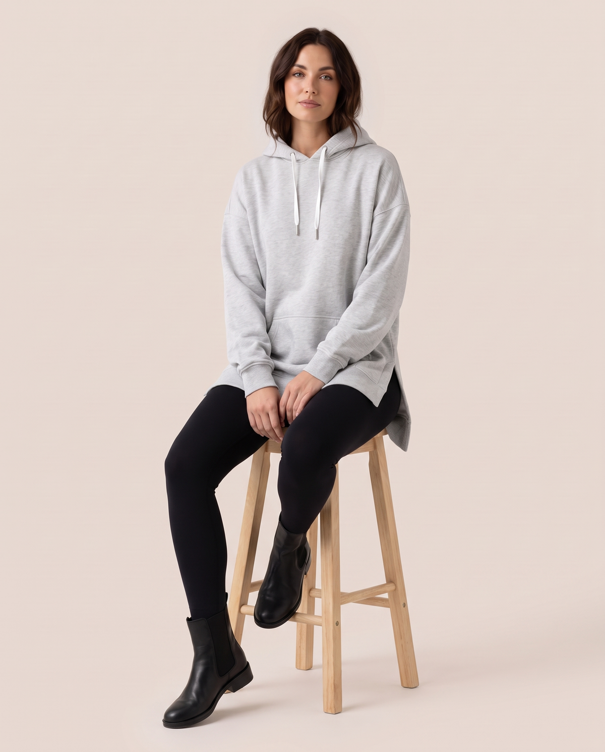 Oversized Hoodie Dress — worn seated