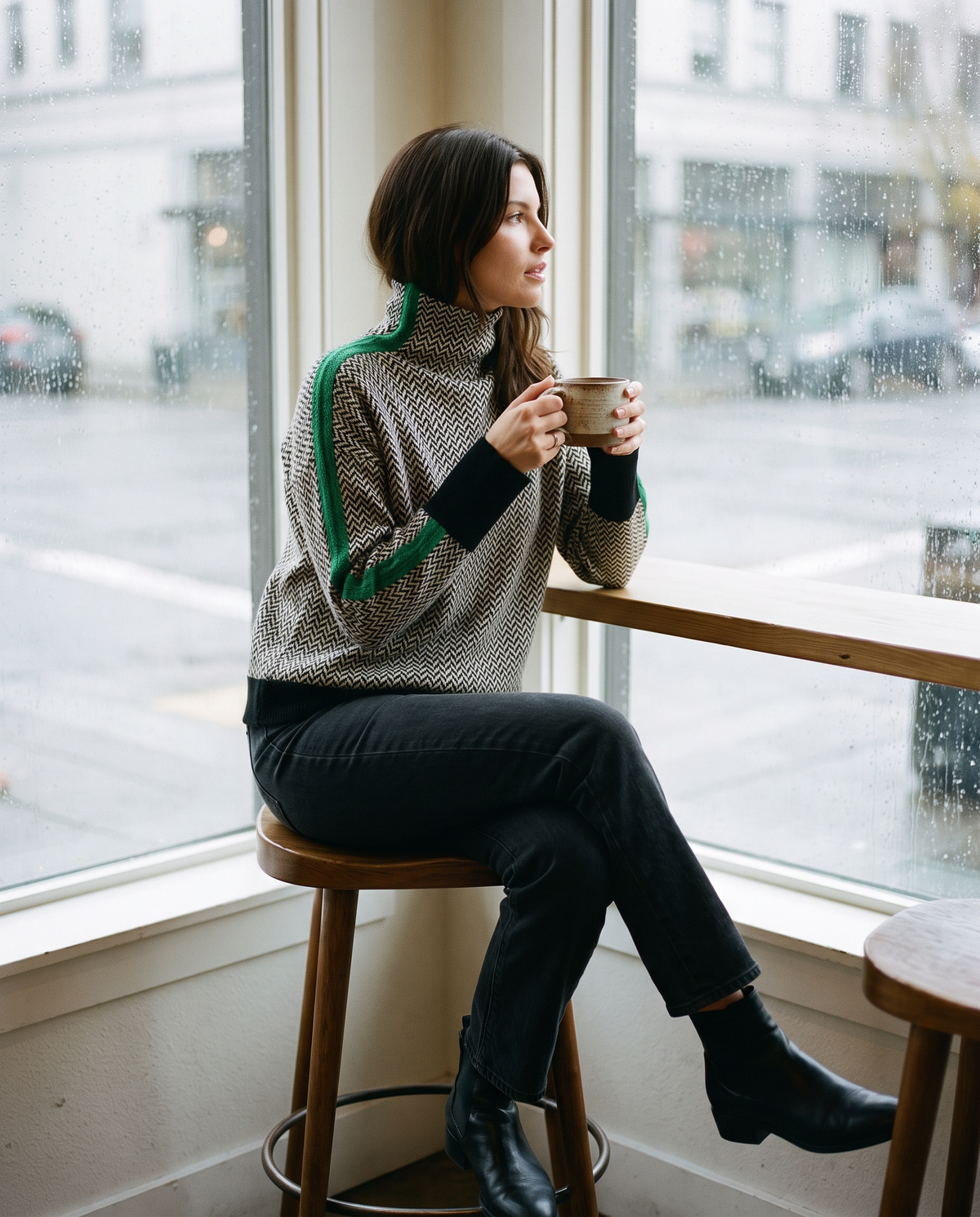 Striped Herringbone Turtleneck Sweater — worn at a café window on a rainy Portland afternoon