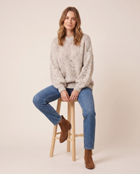 Chunky Knit Crew Neck Sweater — worn seated