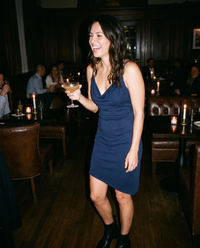 Berkshire Sleek Draped Cowl-Neck Cocktail Dress — at a candlelit cocktail bar