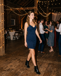 Berkshire Sleek Draped Cowl-Neck Cocktail Dress — at an autumn barn wedding reception