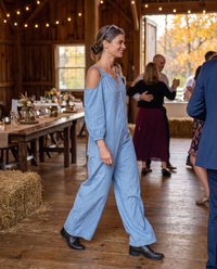 Ashland Relaxed Cold-Shoulder Wide-Leg Jumpsuit — at an autumn barn wedding reception
