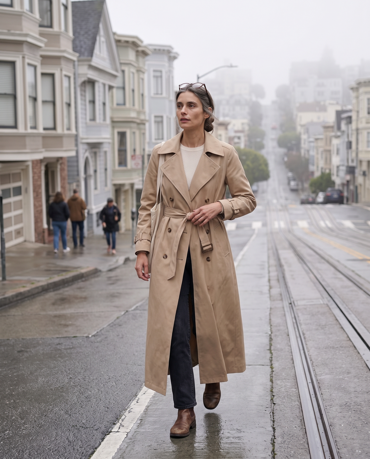 Belted Maxi Trench Coat for Women — walking up a foggy San Francisco street