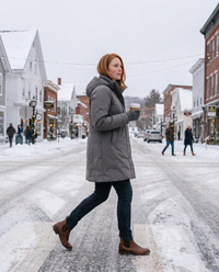 Heavyweight Waterproof Hooded Parka — crossing a snowy Vermont village street