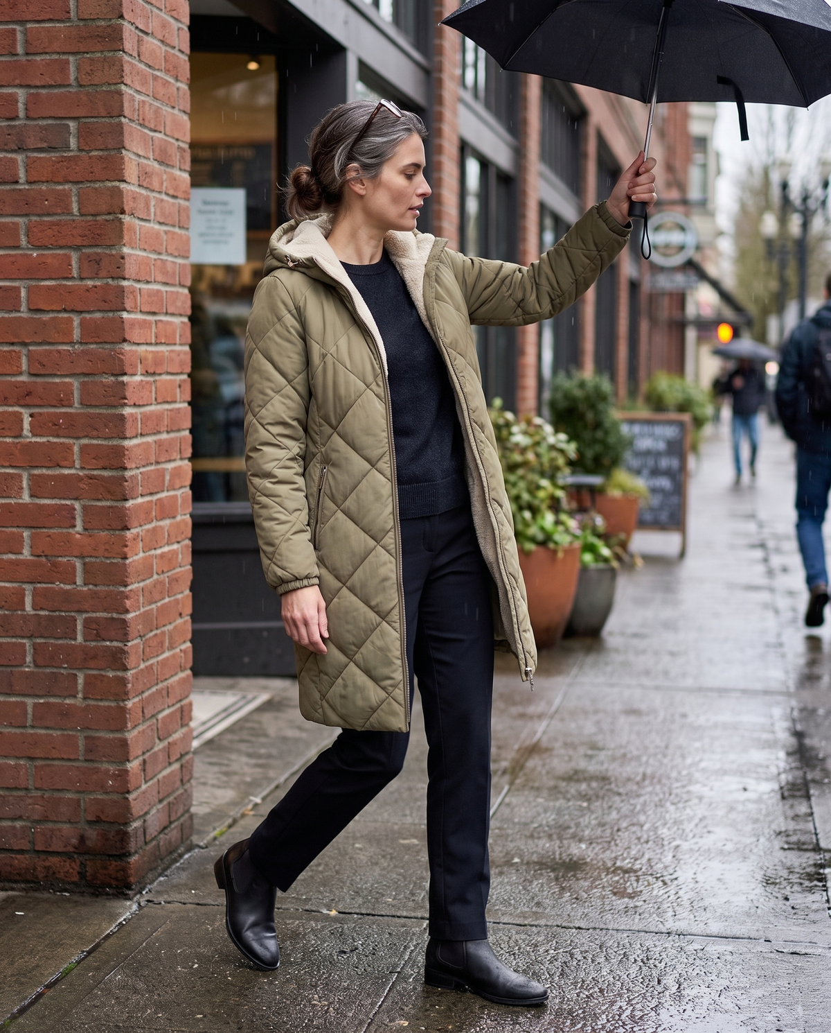 Waterproof Hooded Longline Winter Jacket — stepping out into the drizzle in Portland
