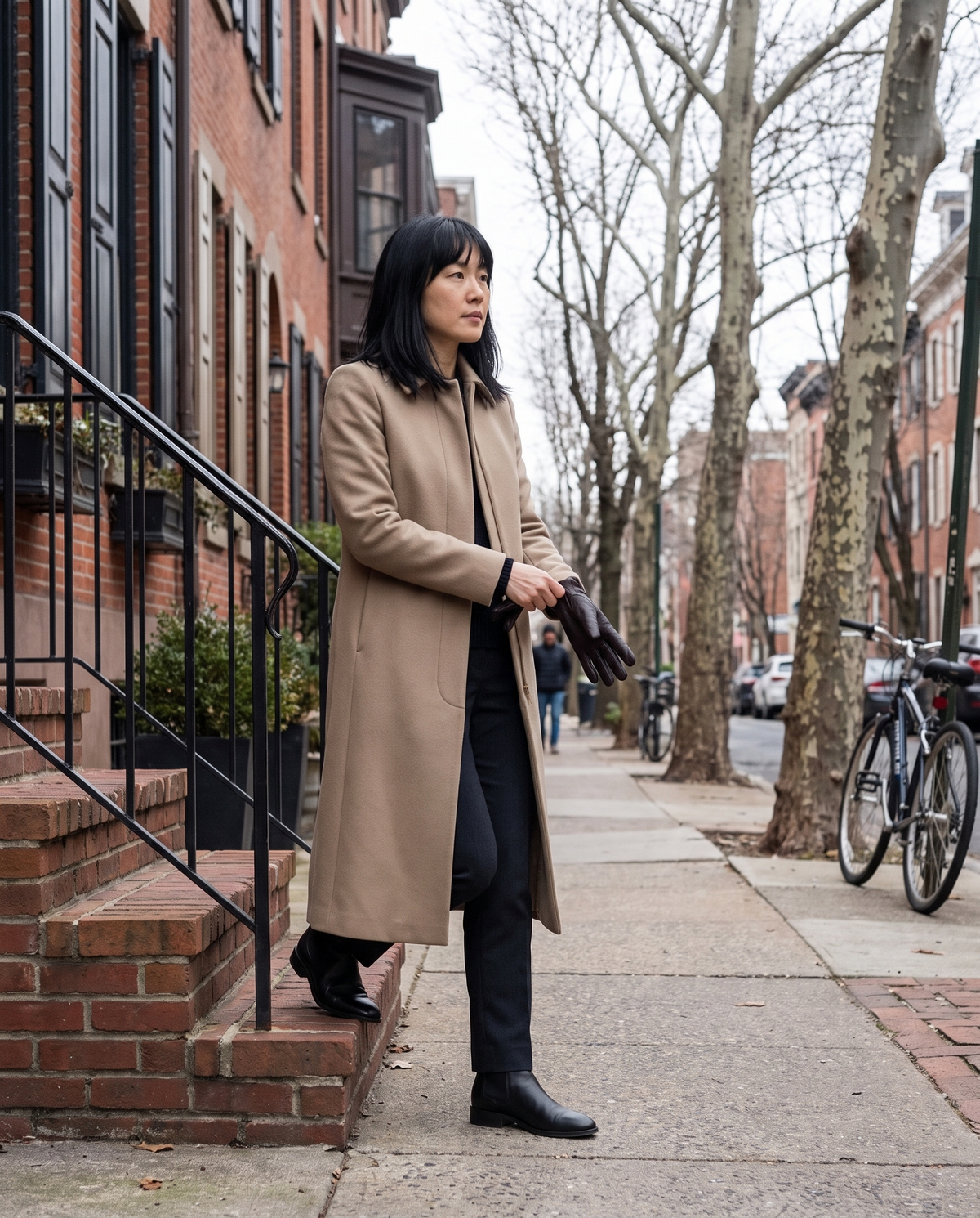 Slim-Fit Longline Coat for Women — stepping out of a Philadelphia rowhouse on a cold morning