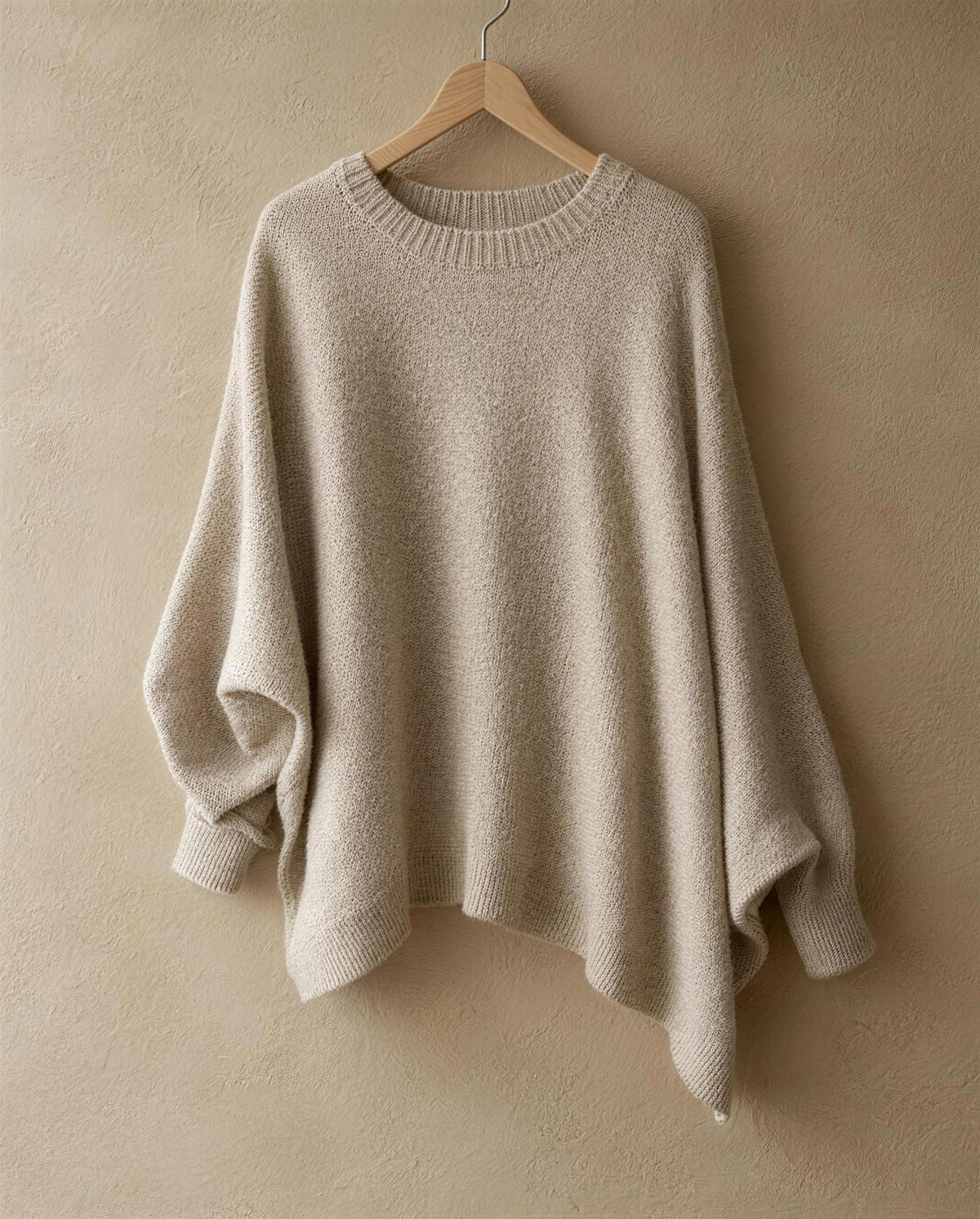 Ghent Warm Wool-Blend Draped Sweater with Asymmetric Hem — neckline and draped sleeve detail