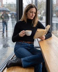 Highline Warm Fleece-Lined Slim Turtleneck Sweater — reading in a café on a rainy afternoon