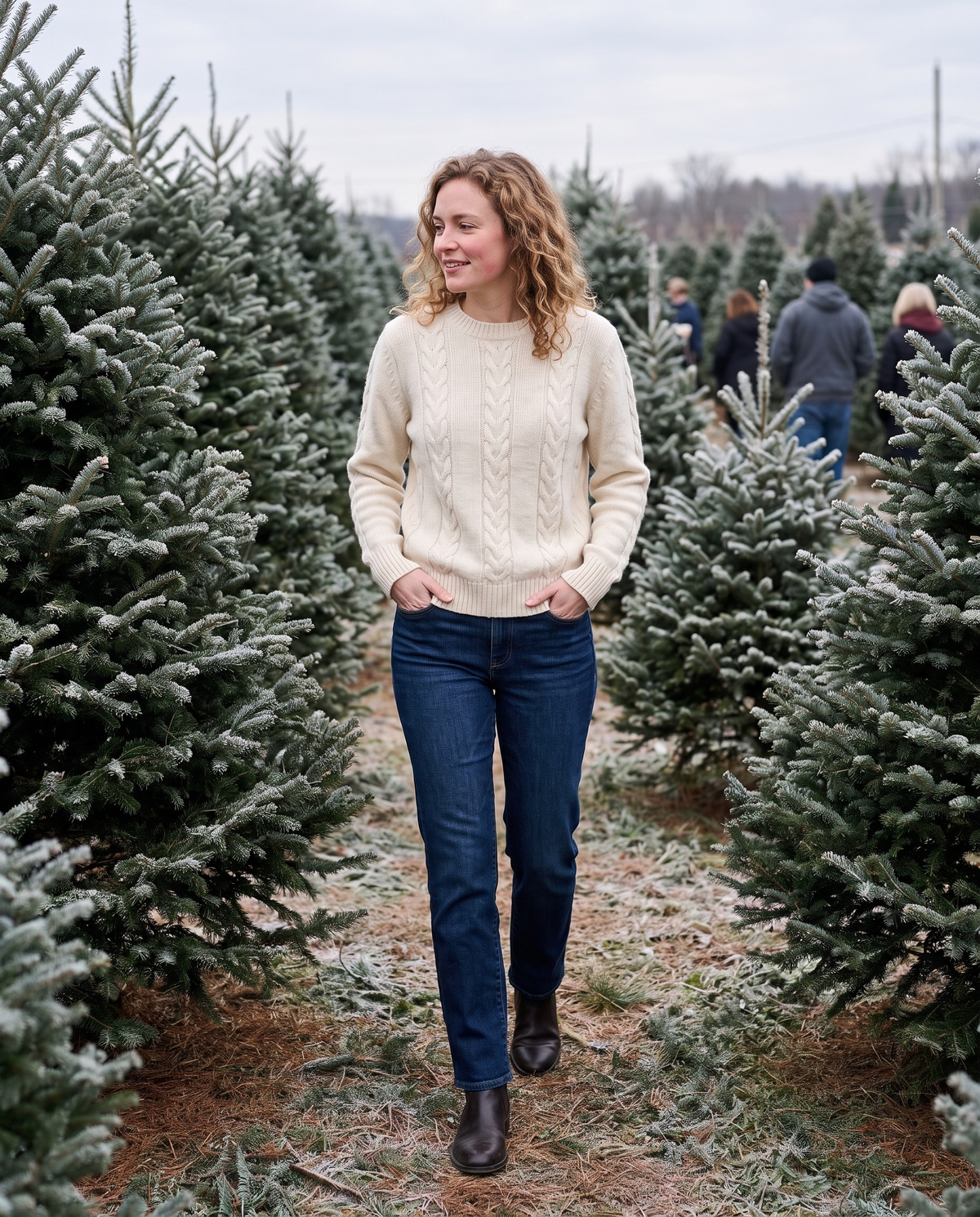 Favignana Classic Cable Knit Crew Neck Sweater — choosing a tree at a Christmas-tree farm