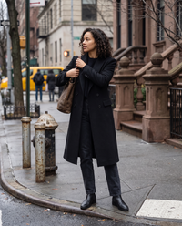 Longline Double-Breasted Tailored Coat — waiting to cross a Manhattan street on a cloudy afternoon