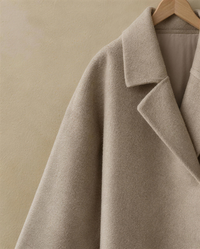 Oversized Wool-Blend Coat with Dropped Shoulders — dropped shoulder and sleeve detail