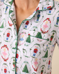Women's Christmas Pajama Top, Nutcracker Print — close-up of print, green piping, pocket and buttons