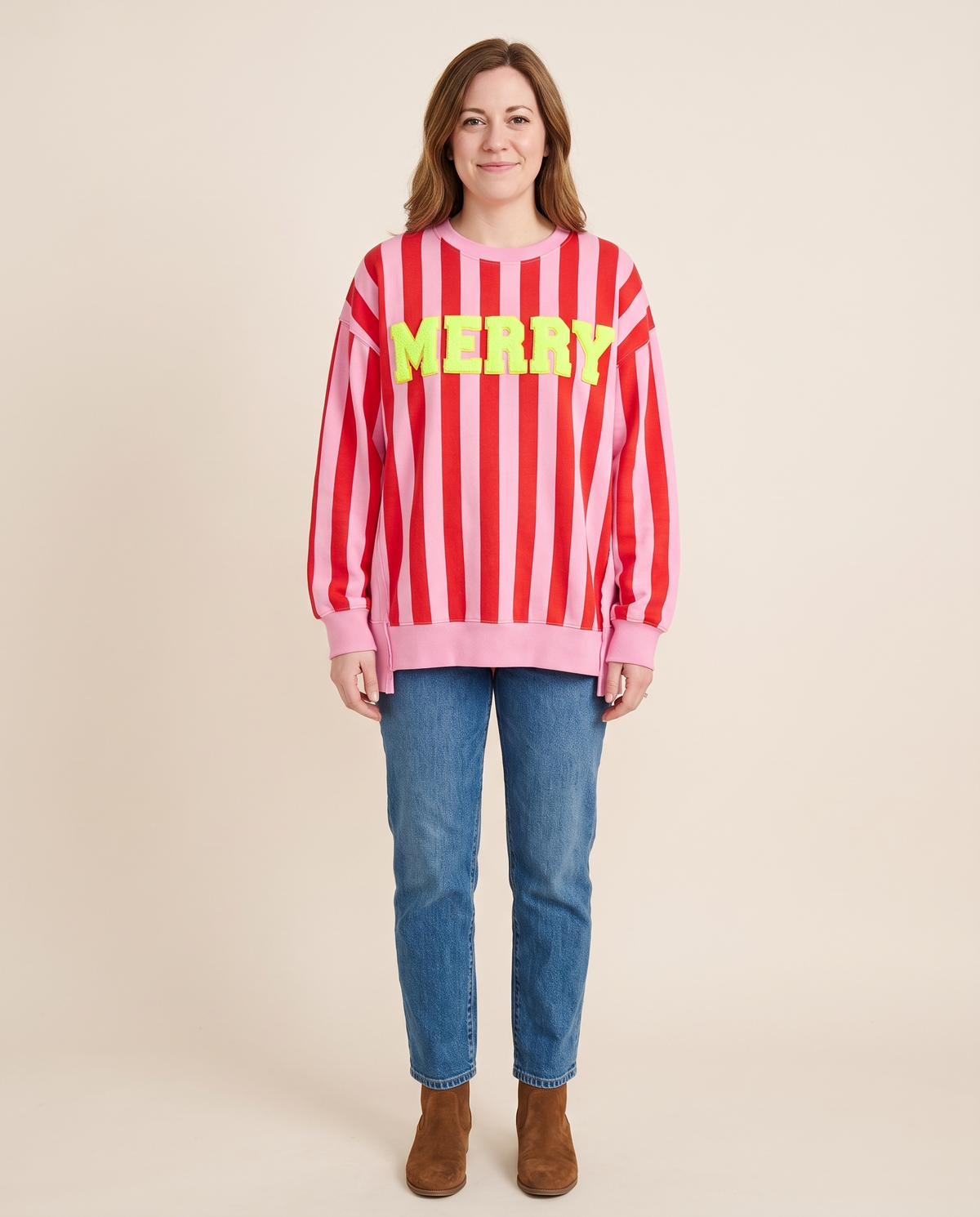 Women's Christmas Sweater, Striped Merry Sweatshirt — pink and red stripe, studio front