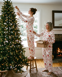 Women's Christmas Pajamas, Candy Cane Print Knit PJ Set — mother and daughter decorating the Christmas tree