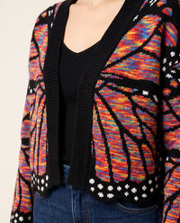 Women's Cropped Butterfly Wing Cardigan — rainbow, close-up of the knit wing pattern and dotted hem