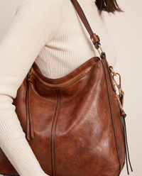 Women's Hobo Bag Purse with Anti-Theft Pocket — top zip, tassel pull and gold hardware detail