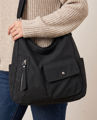 Women's Convertible Shoulder Bag, Crossbody Backpack Purse — snap flap pocket, vertical zip pocket and side pocket detail