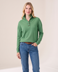 Women's Cashmere Stand Collar Sweater in Matcha green, studio front