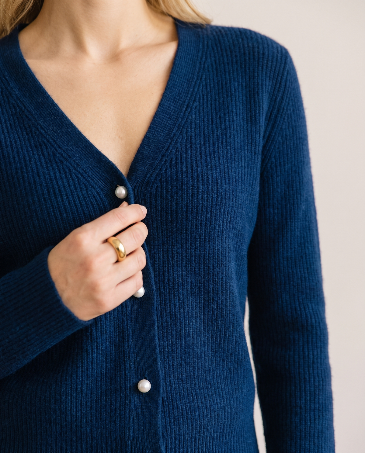 Women's Cashmere V-Neck Cardigan, close-up of the ribbed cashmere knit and pearl buttons