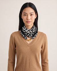 Women's Silky Leopard Neck Scarf in Black, studio front