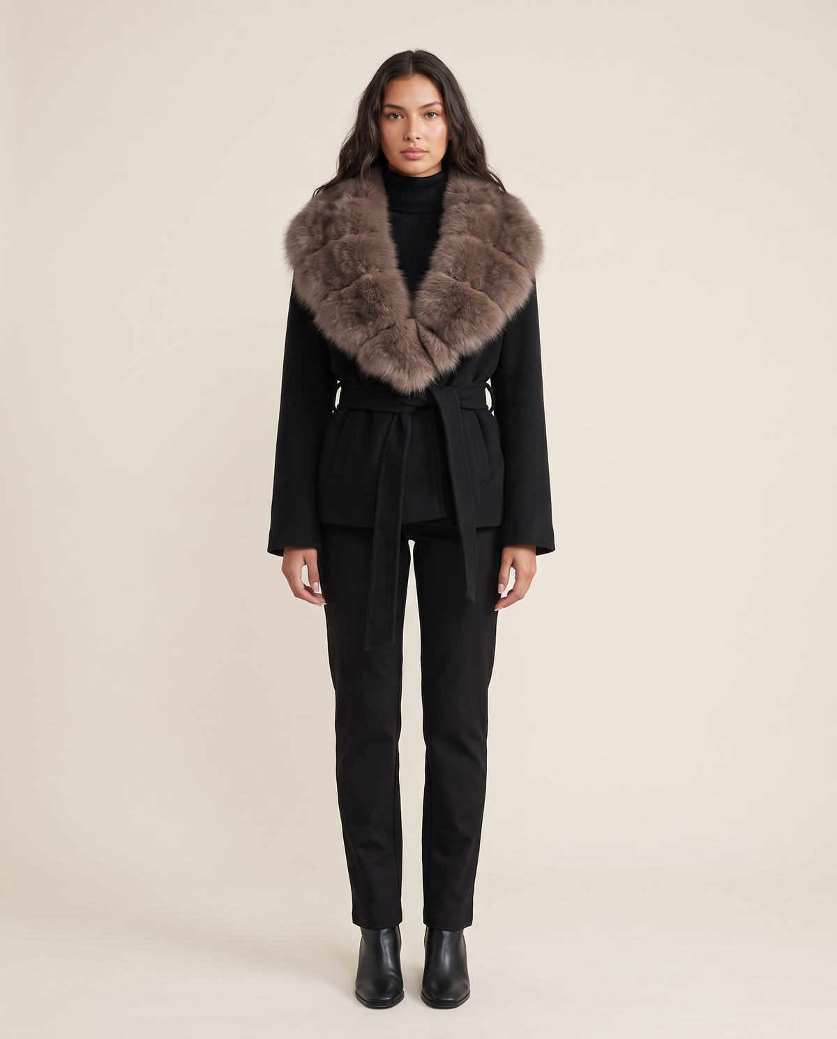 Women's belted wool wrap jacket with faux fur collar in black, studio front