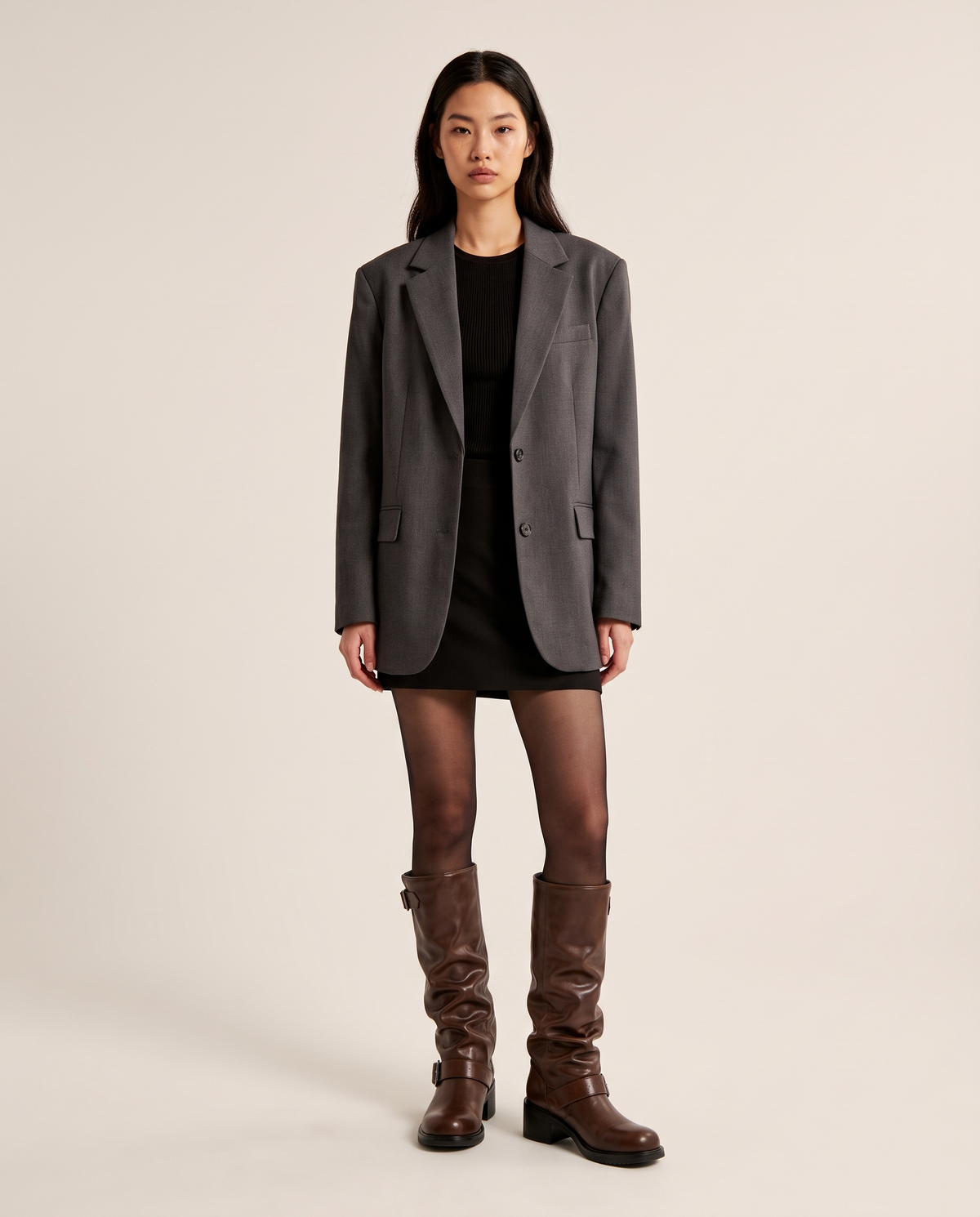 Women's slouchy knee-high biker boots in brown faux leather, studio front