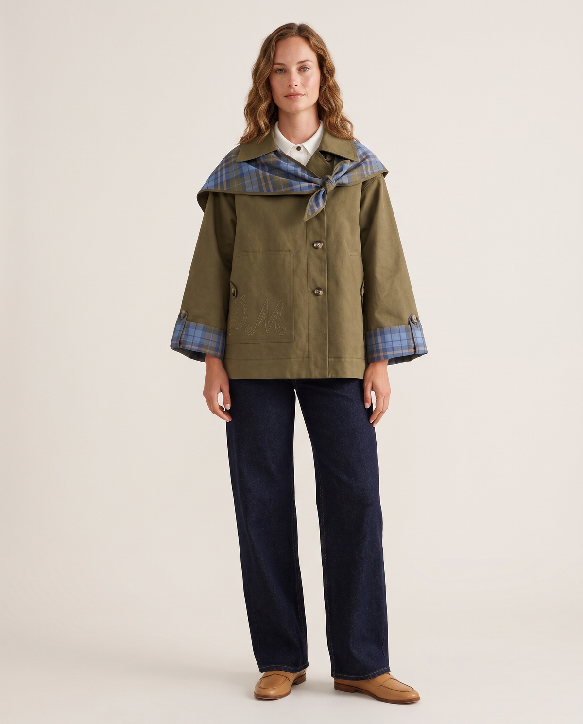 Women's reversible short trench jacket with cape collar in olive green, studio front