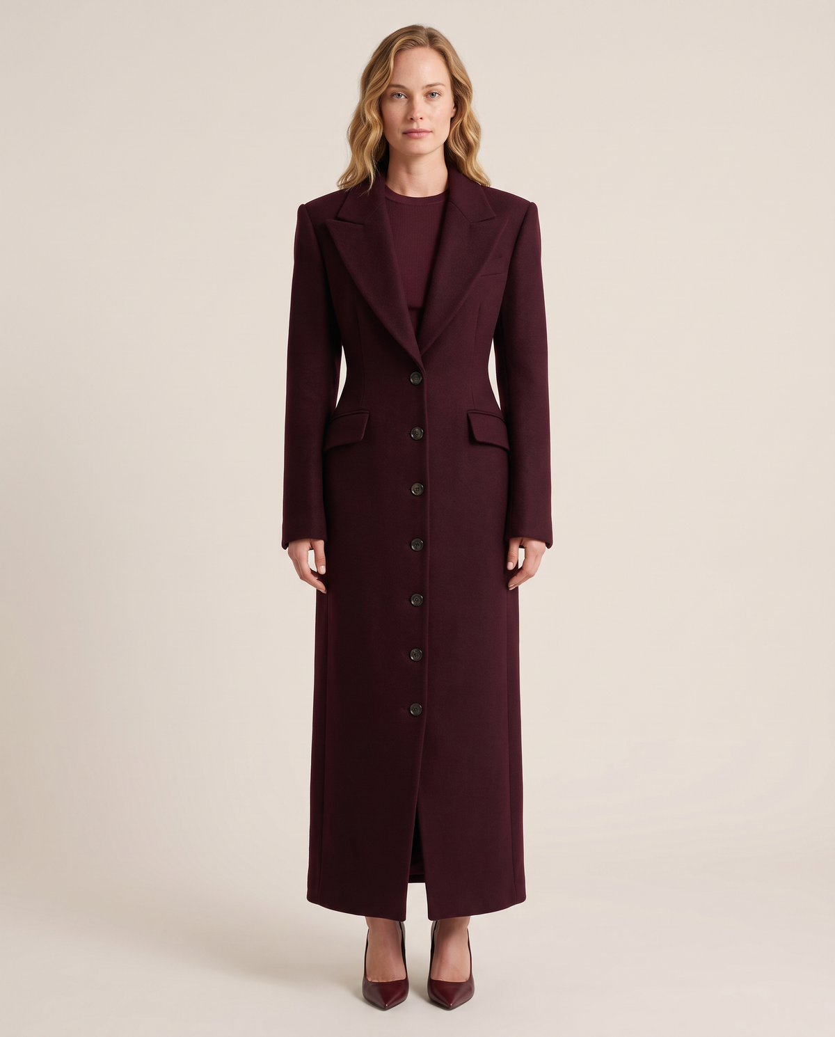 Women's tailored longline wool coat in burgundy, studio front