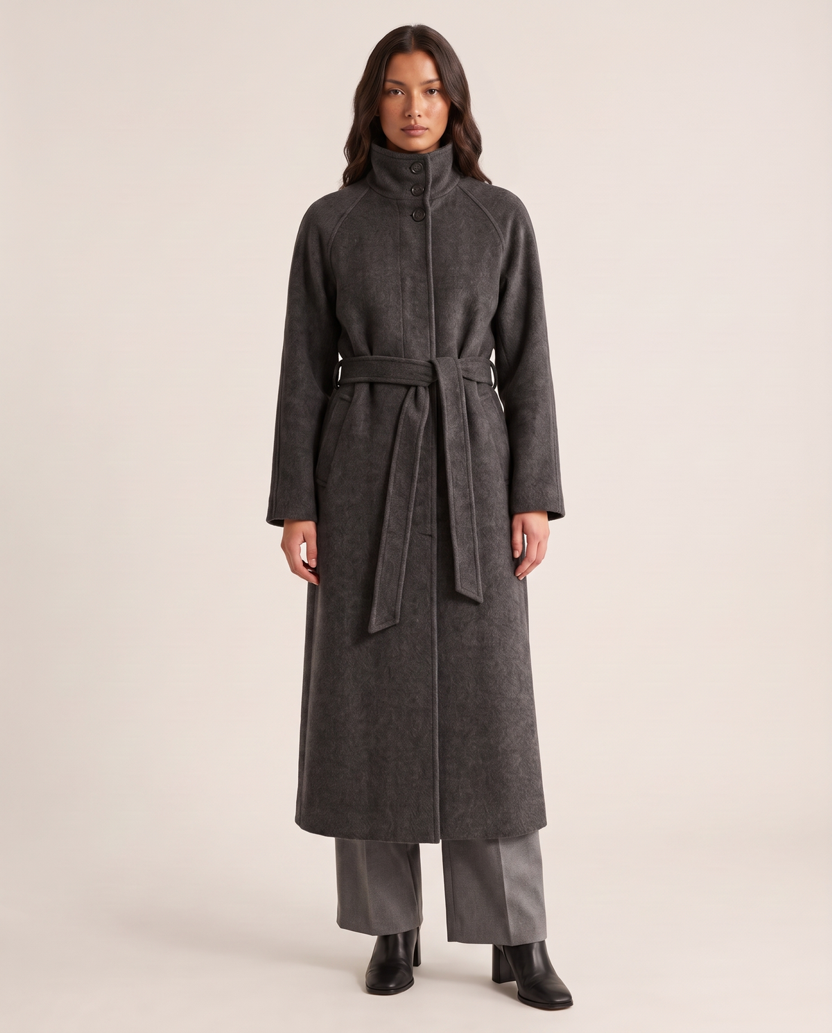 Women's belted maxi wool coat with stand collar in dark grey, studio front