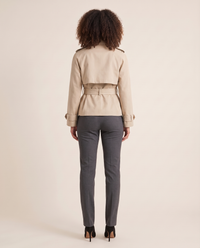 Short beige trench coat for women, back view